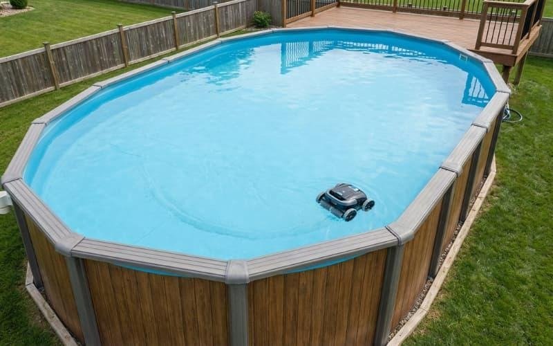 A robotic pool cleaner working in an above ground pool with clearly visible structural design